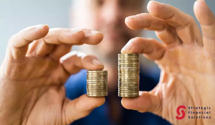 value-of-professional-financial-advice Person comparing two stacks of coins to illustrate the cost and value of financial advice.